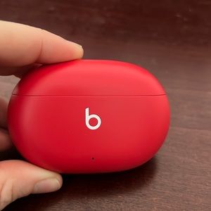 Beats earbuds, red.